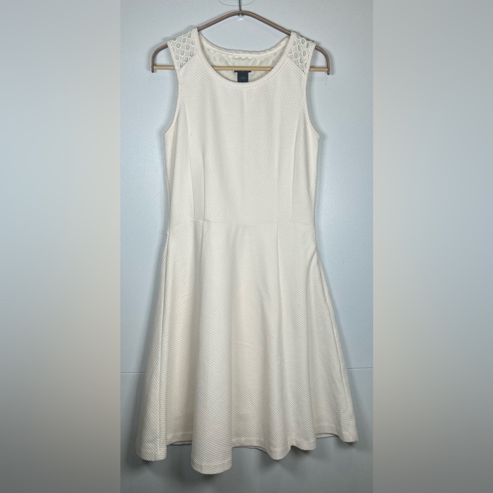 Ann Taylor Cream Sleeveless Dress. Exquisite design in the back. Size 8.